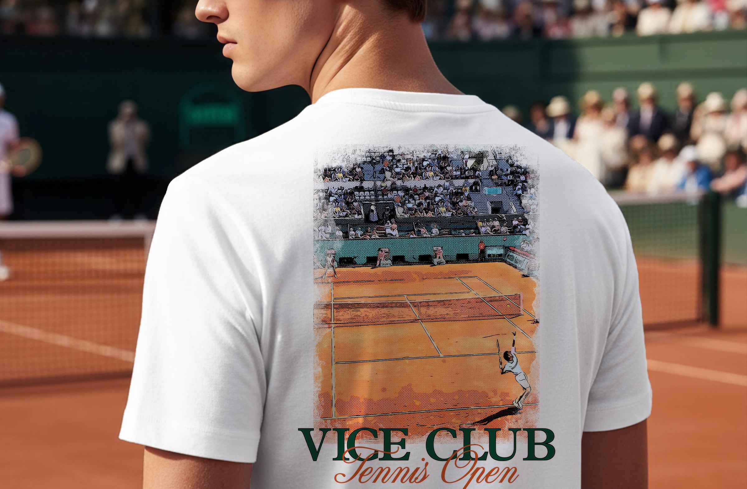 Rear view of man wearing white Vice Club t-shirt with tennis court graphic, set in a Grand Slam match environment with crowd in background.